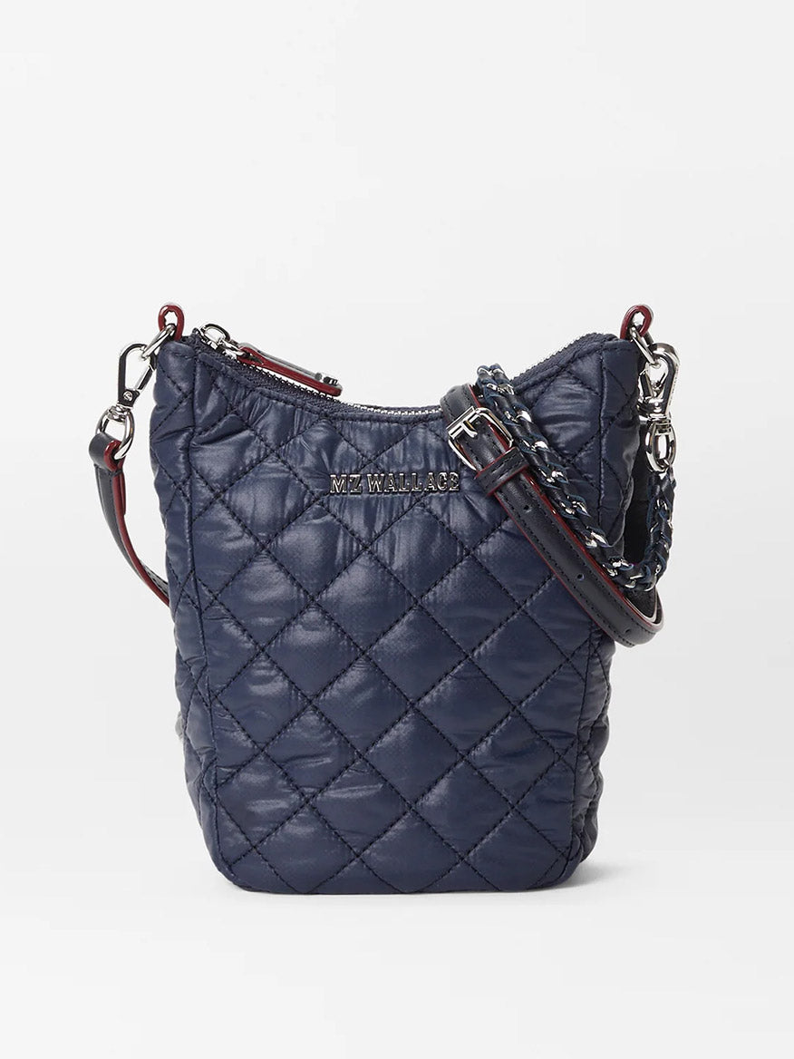 A small quilted navy MZ Wallace Crosby Go in Dawn Oxford with a chain and leather shoulder strap, featuring Italian leather trim, a top zipper closure, and the brand name "MAX&MAXACE" on the front.