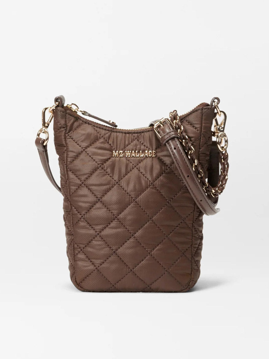 MZ Wallace Crosby Go in Walnut Oxford: A chic brown quilted shoulder bag with gold hardware, an engraved logo, and a detachable, adjustable strap. This elegant piece from the Crosby Go collection features Italian leather trim.