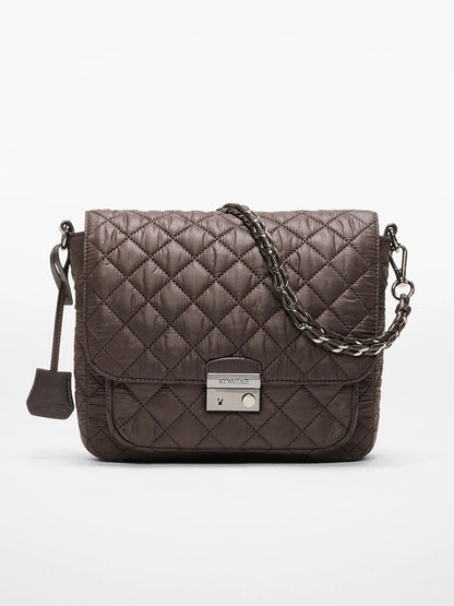 The MZ Wallace Crosby Lock Medium Crossbody in Espresso Oxford features quilted brown fabric, a chain and leather strap, a flap closure, and a metal clasp on the front.