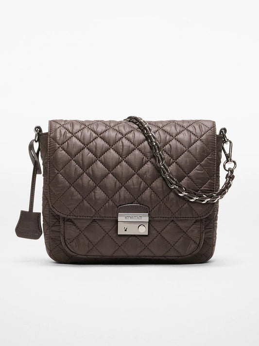 The MZ Wallace Crosby Lock Medium Crossbody in Espresso Oxford features quilted brown fabric, a chain and leather strap, a flap closure, and a metal clasp on the front.