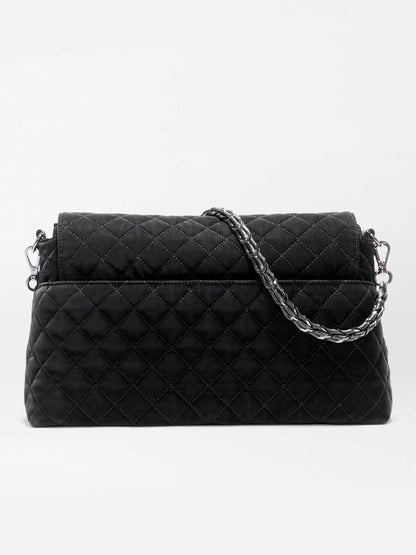 Black quilted MZ Wallace Crosby Lock Shoulder in Black Velvet Finish bag featuring a metal chain strap.