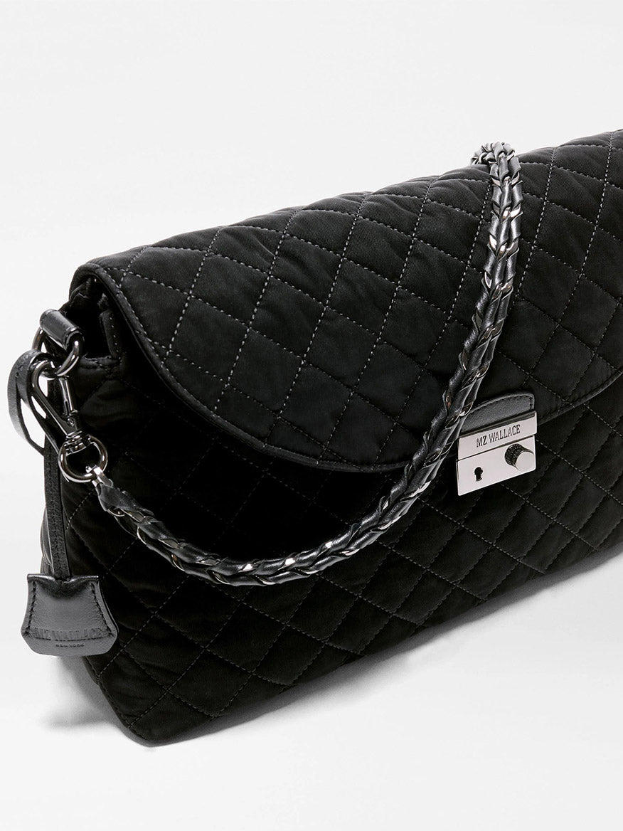 MZ Wallace Crosby Lock Shoulder in Black Velvet Finish: a black quilted Italian leather shoulder bag with a braided chain strap and a silver-tone lock clasp.
