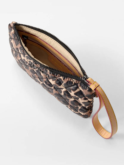 The MZ Wallace Flat Metro Wristlet in Leopard Oxford features a quilted animal print, a beige interior, wrist strap, and is crafted from durable REC Oxford Fabrication.