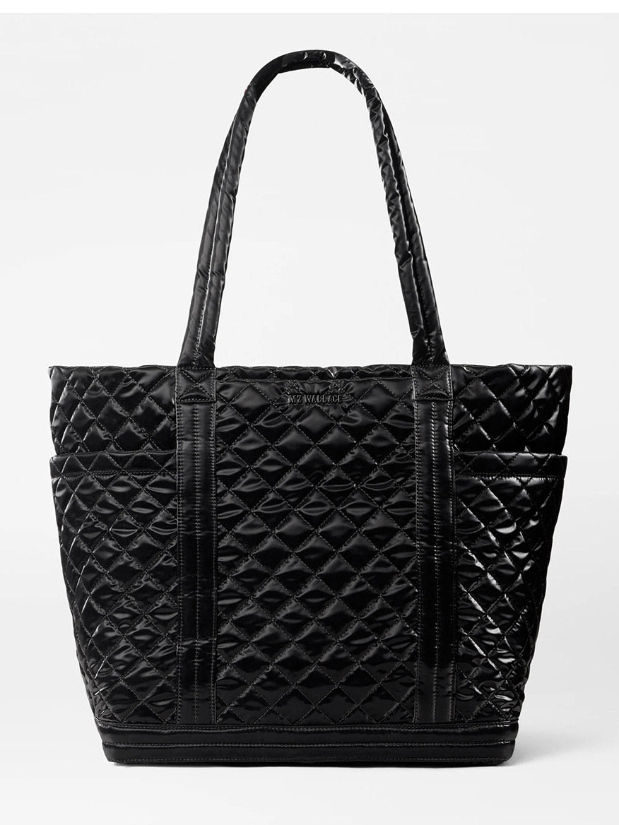 MZ Wallace Large Empire Tote in Black Liquid Oxford, a stylish lightweight bag featuring a quilted nylon design with two long handles and a subtle logo on the front, displayed against a plain white background.