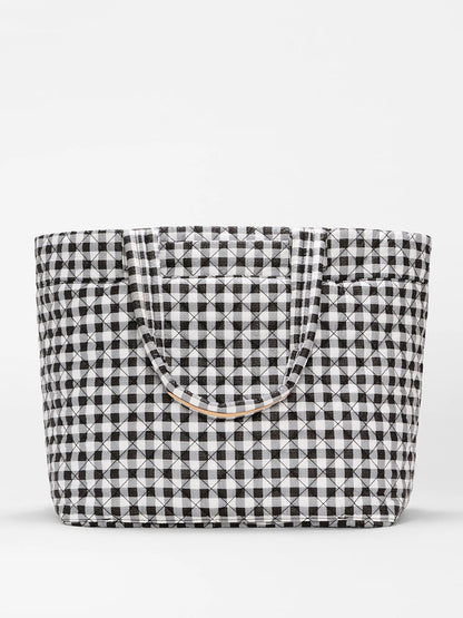 The MZ Wallace Large Metro Tote Deluxe in Black/White Gingham Oxford, travel-ready with two handles and ideal for carrying essentials, is displayed against a plain white background.