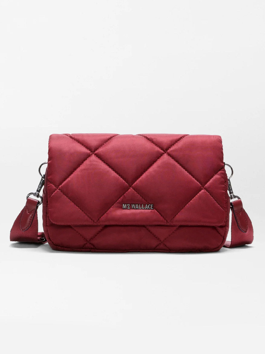 The MZ Wallace Madison Flap Crossbody in Claret Bedford, featuring quilted recycled Bedford nylon, silver hardware, and an adjustable strap, is shown against a plain white background.
