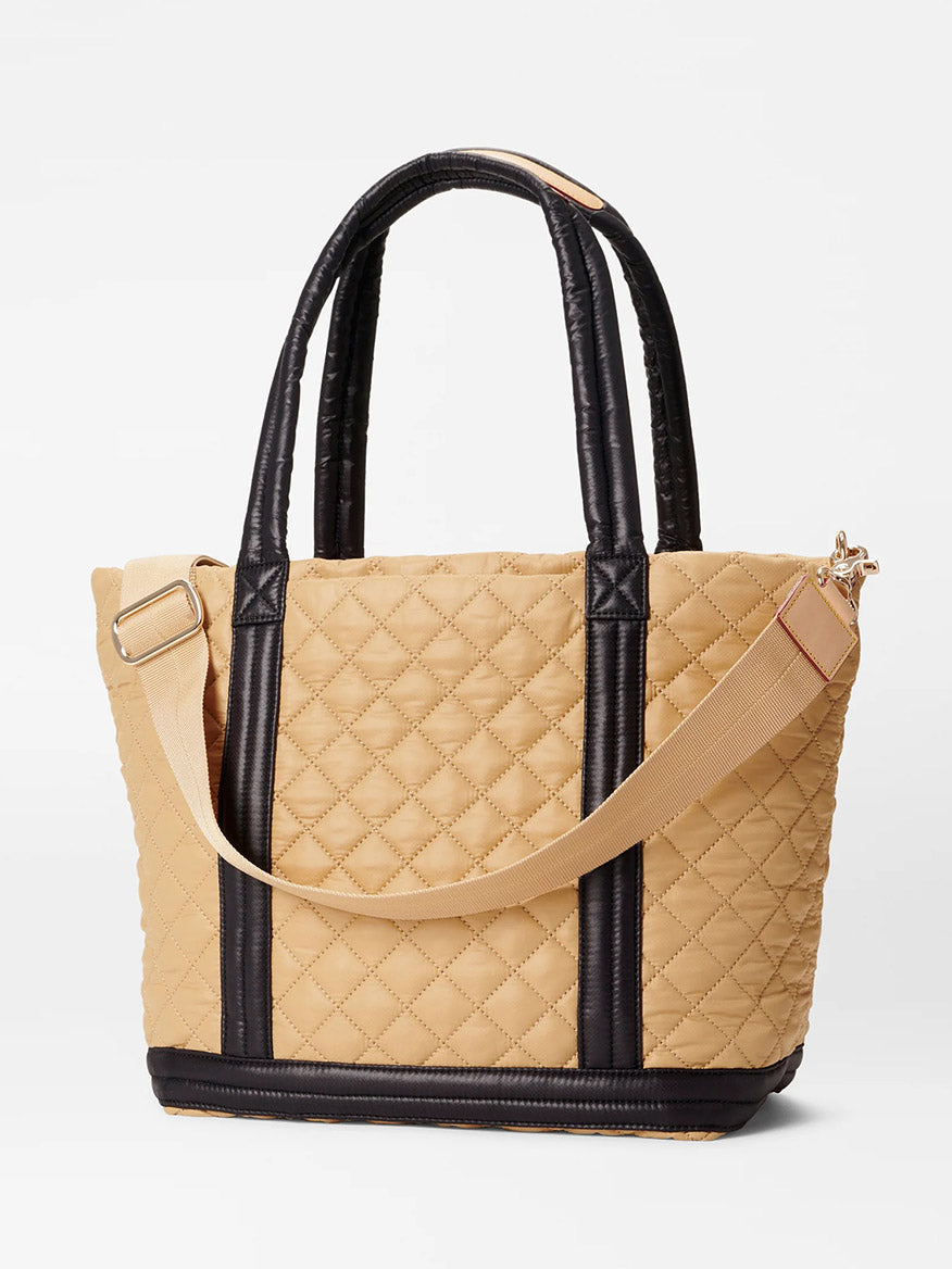 A spacious MZ Wallace Medium Empire Tote in Camel & Black with black leather handles and a zipper closure.
