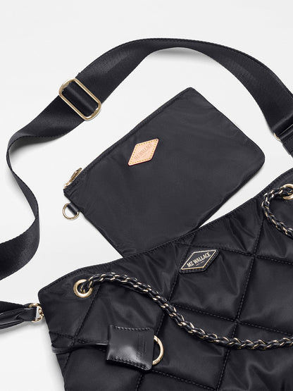 The MZ Wallace Medium Frankie Tote in Black Bedford, displayed on a white background, features elegant chain straps, an adjustable crossbody strap, and comes with a matching black zippered pouch.