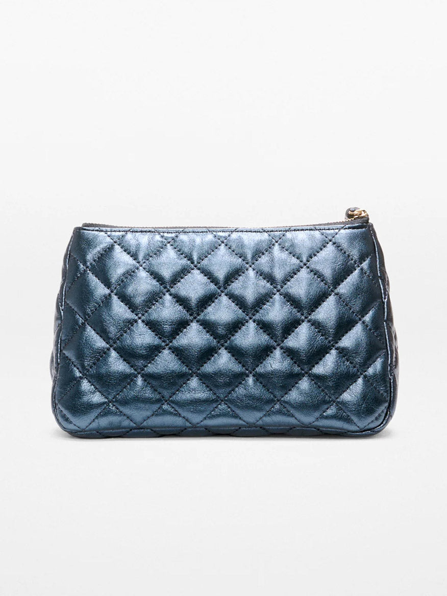 The MZ Wallace Medium Luna Cosmetic in Midnight Metallic Leather is a medium-sized, metallic blue quilted pouch with a zipper closure and light gold hardware, shown against a plain white background.