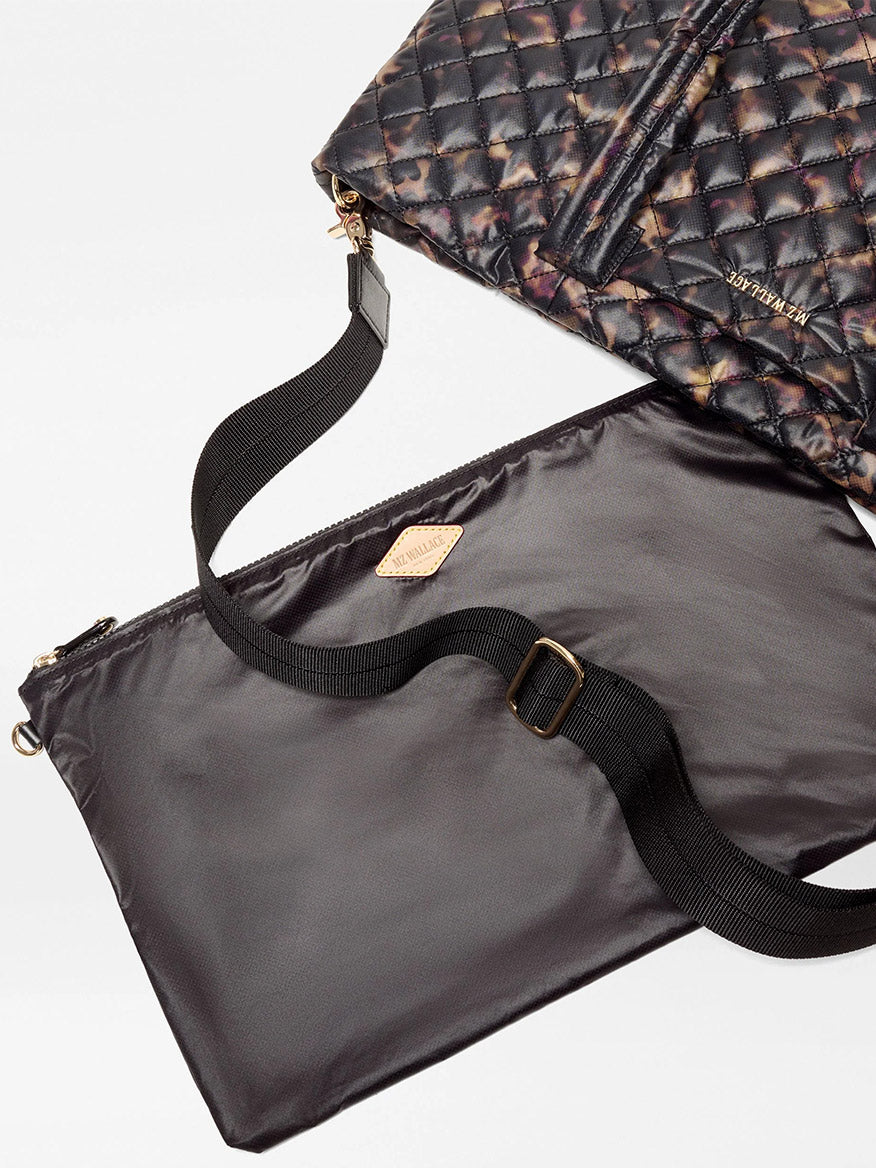 MZ Wallace Medium Metro Tote Deluxe in Tortoise Shell Oxford with a detachable black crossbody strap and a matching pouch.