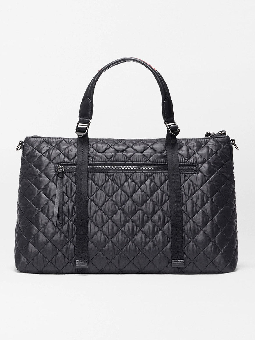 The MZ Wallace Medium Park Satchel in Black Oxford features two top handles, a front zippered pocket, and vertical strap detailing—an ideal everyday bag shown against a plain light background.