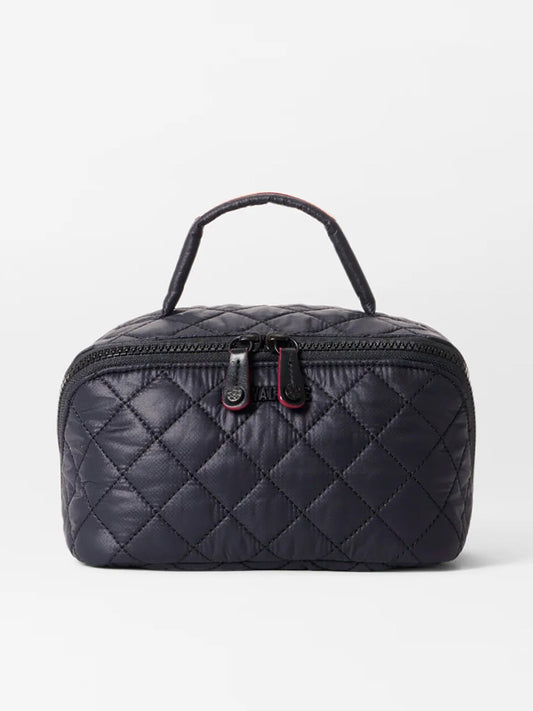 The MZ Wallace Metro Accordion Cosmetic II in Black Oxford features a quilted design, Italian leather trim, a top handle, and two zippers, shown against a plain white background.