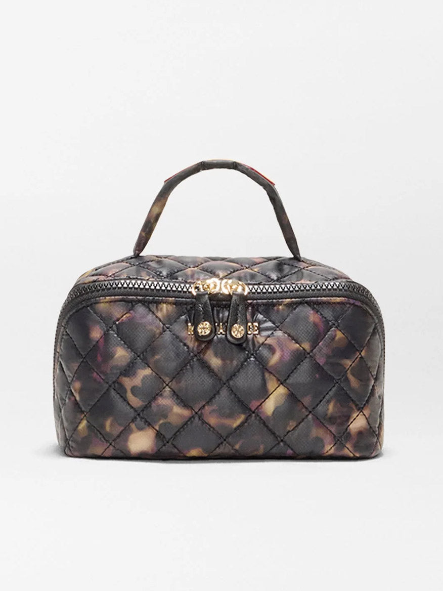 MZ Wallace Metro Accordion Cosmetic II in Tortoise Shell Oxford: a quilted, top-handle cosmetic bag in tortoise shell recycled nylon with gold-toned double zippers.