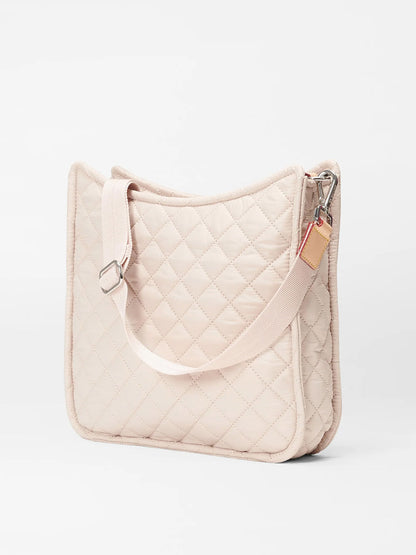 Quilted MZ Wallace Metro Box Crossbody in Mushroom Oxford with adjustable and detachable crossbody strap, featuring Italian leather trim, on a white background.