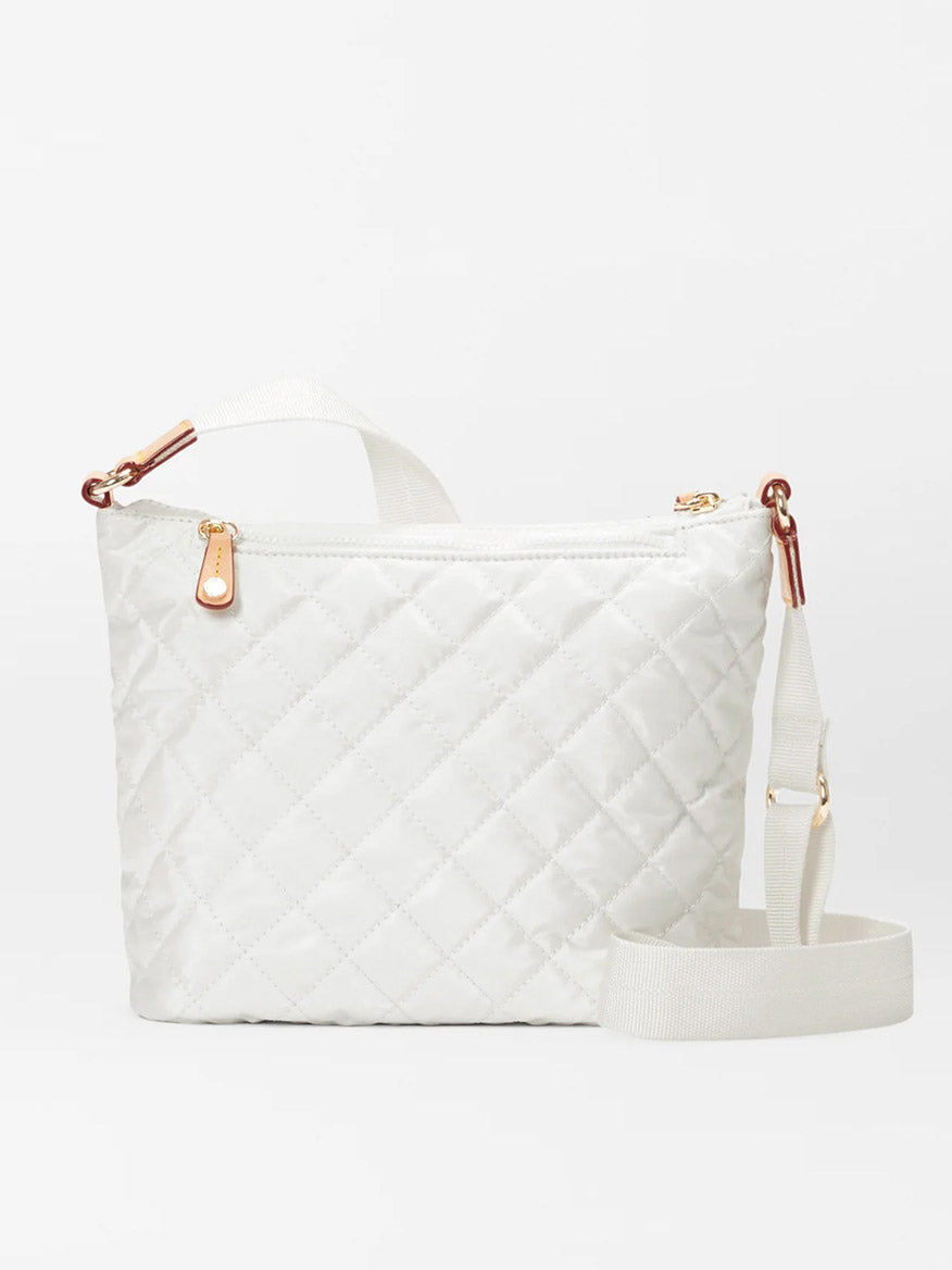 MZ Wallace Metro Scout Deluxe in Pearl Metallic Oxford with a zipper closure and detachable shoulder strap, displayed against a plain background.