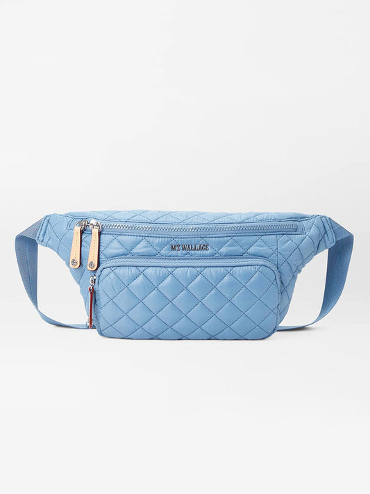 Sustainable MZ Wallace Metro Sling in Cornflower Blue Oxford hands-free bag with zip closures.