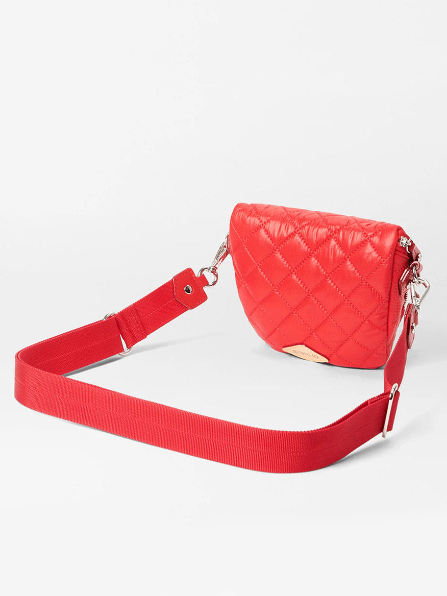 The MZ Wallace Micro Crosby Crossbody Sling in Bright Cherry Bedford is a small quilted red shoulder bag featuring a detachable crossbody strap and metal hardware, set against a white background. Perfect for fans of the Micro Crosby Sling style.