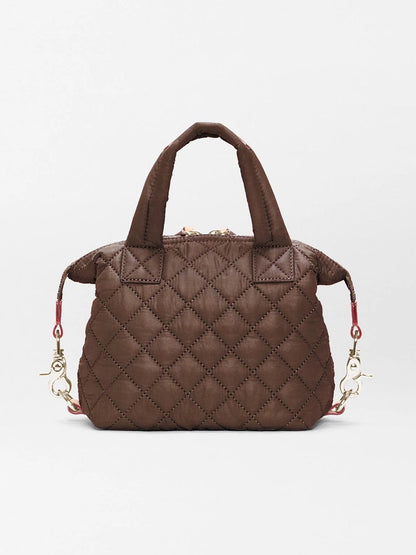 Small, brown quilted MZ Wallace Micro Sutton in Walnut Oxford handbag with dual top handles and detachable side straps.