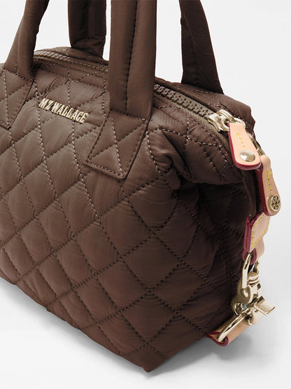 MZ Wallace Micro Sutton in Walnut Oxford quilted mini satchel featuring a top zipper, dual handles, and a detachable shoulder strap.