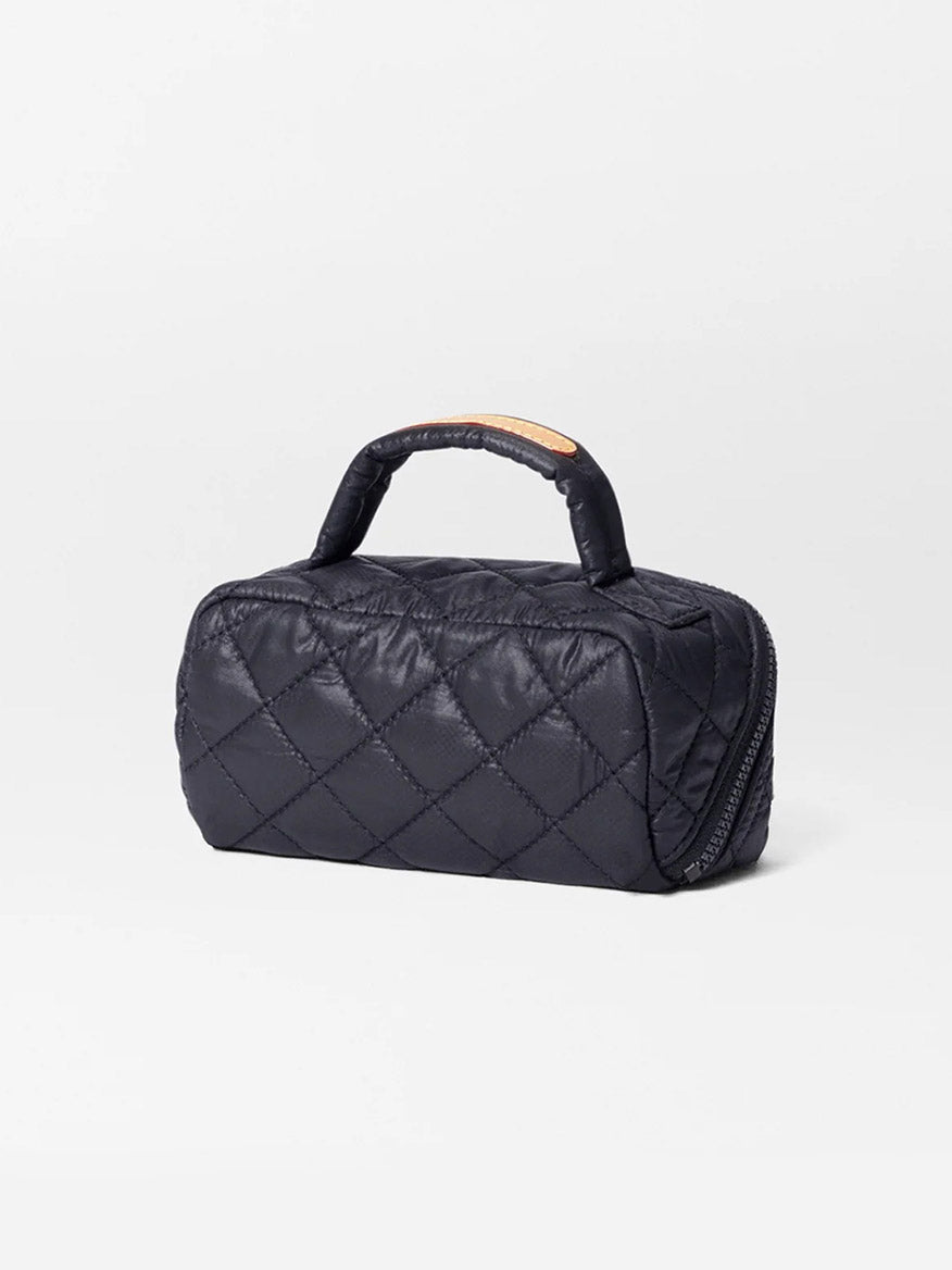 The MZ Wallace Mini Accordion Jewelry Case in Black Oxford features a compact design with Italian leather trim, a zippered closure, interior pockets, and a single handle, shown against a plain white background.