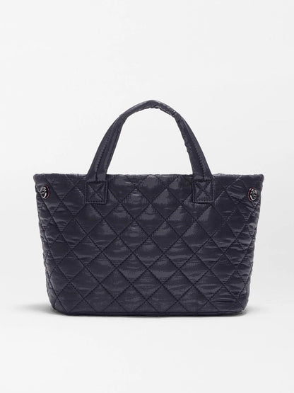 The MZ Wallace Mini City Tote in Black Oxford is a black quilted mini tote bag made from REC nylon, featuring two handles and shown against a plain white background.