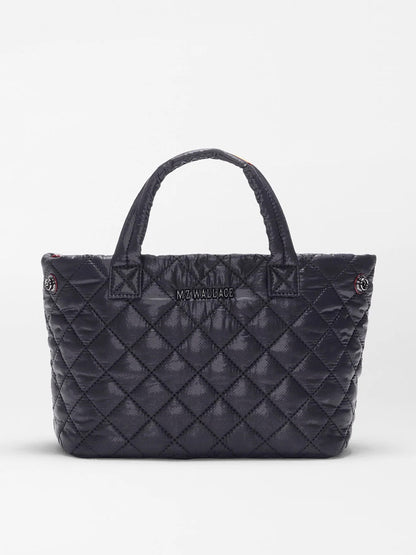 The MZ Wallace Mini City Tote in Black Oxford, made from REC nylon, features short handles, a crossbody strap, and "MZ WALLACE" branding on the front, shown against a plain white background.