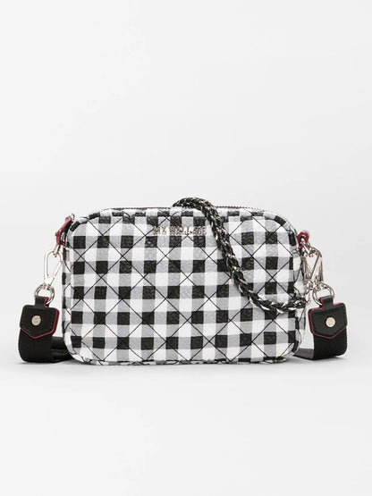 The MZ Wallace Mini Crosby Crossbody II in Black/White Gingham Oxford features a small rectangular quilted design, silver hardware, and an adjustable crossbody strap for versatile styling.