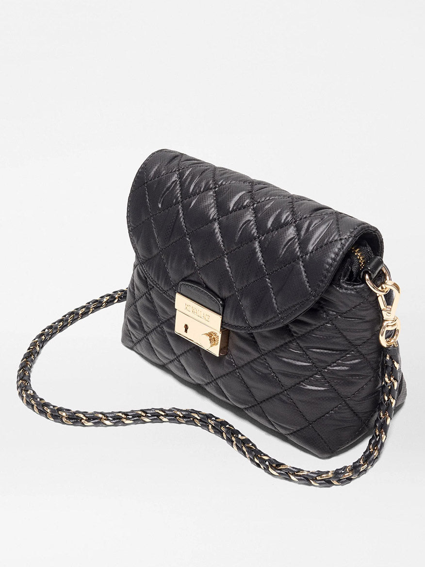 Black MZ Wallace Mini Crosby Lock Shoulder in Black Oxford quilted bag with a gold-tone lock closure and a chain-link strap.