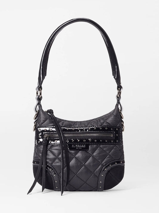 The MZ Wallace Mini Multi Stud Crosby Sienna in Black Stud & Suede is a black purse with a matching strap, crafted from durable Oxford fabric and suede, and features secure zip-top closure.