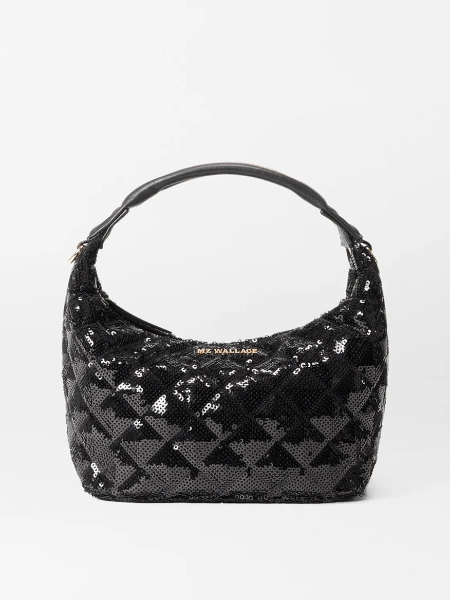 The MZ Wallace Mini Hobo in Black Sequin Oxford is a stylish handbag featuring a short strap and the signature "MZ Wallace" logo on the front. It's perfect for elevating any look, effortlessly transitioning from day to night while showcasing the versatile elegance of crossbody bags.