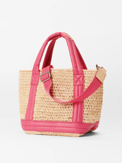 A MZ Wallace Mini Raffia Tote in Raffia/Zinnia with woven straw details and Italian leather trim, featuring a removable shoulder strap against a plain background.