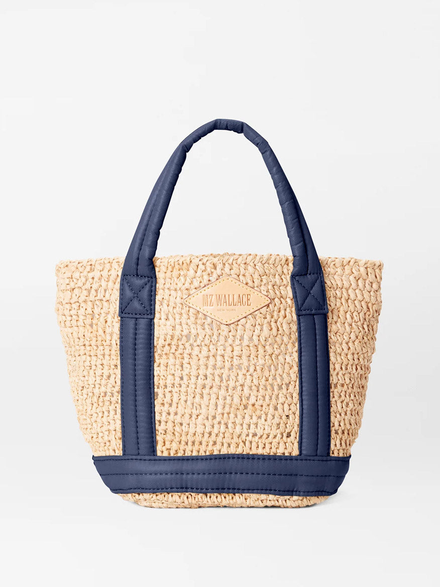 Woven MZ Wallace Mini Raffia Tote in Raffia/Navy with padded nylon handles and Italian leather trim.