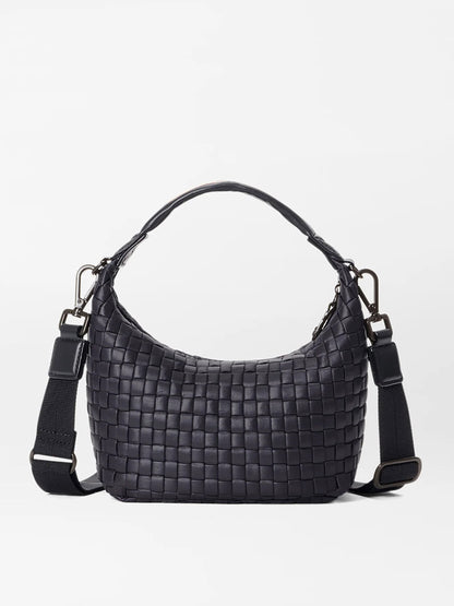 A black MZ Wallace Mini Woven Hobo in Black Oxford, featuring a short handle and an adjustable crossbody strap, set against a plain white background.