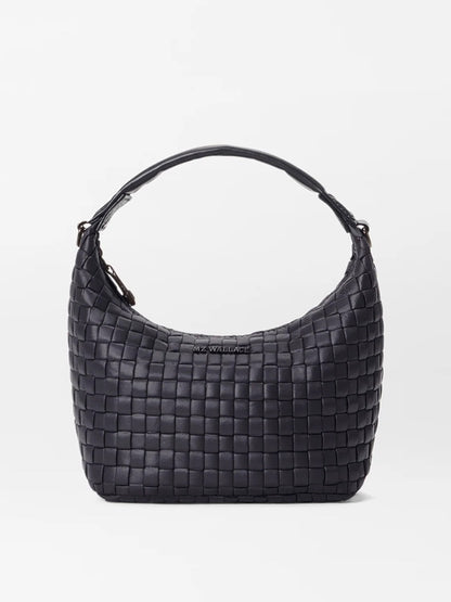 The MZ Wallace Mini Woven Hobo in Black Oxford, showcasing a short handle and set against a white background.