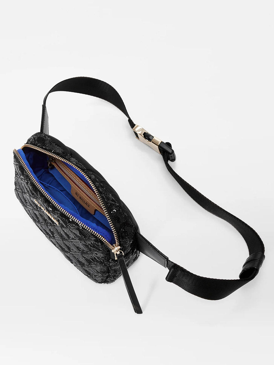 MZ Wallace Quilted Madison Belt Bag in Black Sequin with a blue interior and gold-tone zipper, displayed on a white background.