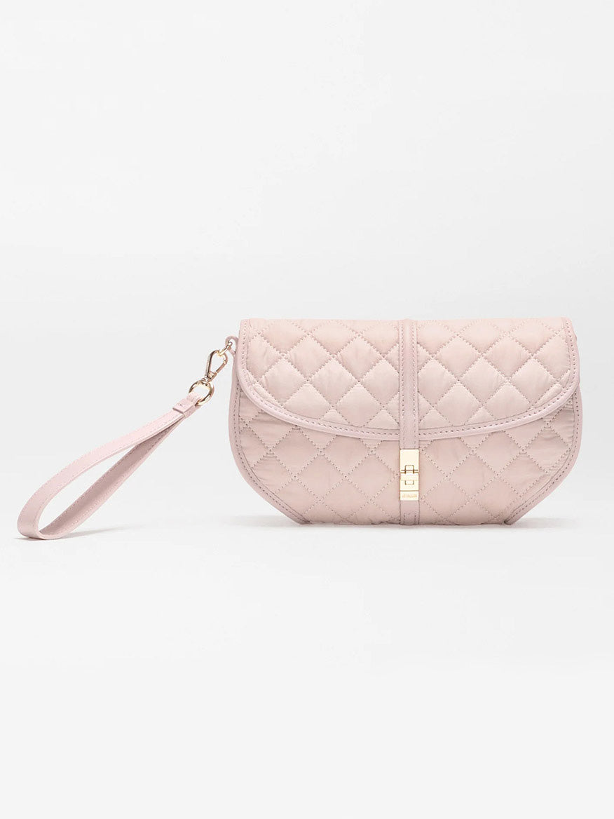 The MZ Wallace Small Astor Convertible Clutch in City Pink Oxford features quilted fabric, a gold clasp, Italian leather trim, and a detachable wrist strap, shown against a plain white background.