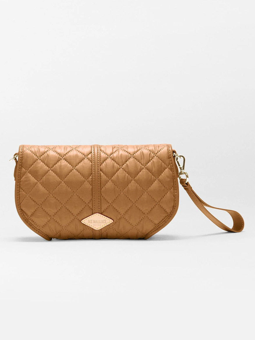 MZ Wallace Small Astor Convertible Clutch in Cognac Oxford, a small quilted tan nylon bag with a wrist strap and gold hardware.