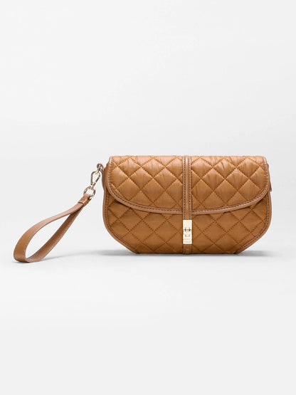 MZ Wallace Small Astor Convertible Clutch in Cognac Oxford, a quilted recycled nylon clutch featuring a wrist strap and a gold-tone clasp closure.