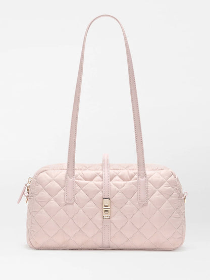 The MZ Wallace Small Astor Satchel in City Pink Oxford is a light pink quilted nylon bag with Italian leather trim, two long shoulder straps, and a gold clasp, shown against a plain white background.