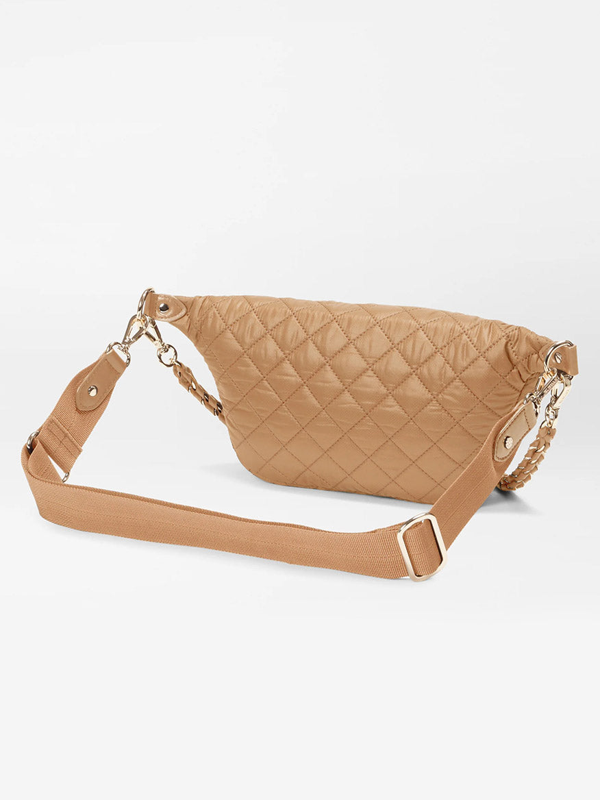 The MZ Wallace Small Crosby Sling Bag in Caramel Oxford is a beige quilted crossbody with Italian leather trim, an adjustable strap, and gold hardware on a white background.