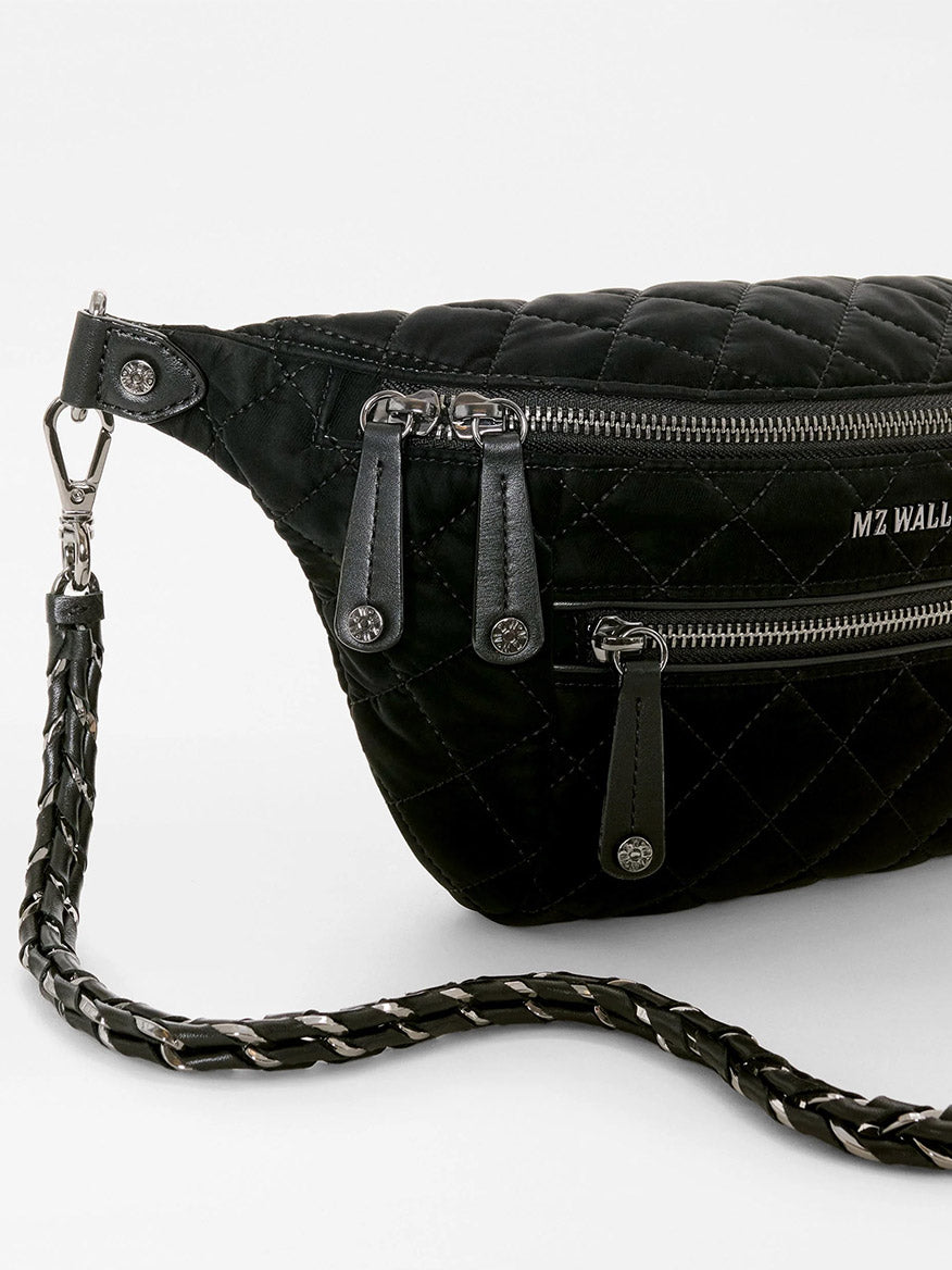 MZ Wallace Small Crosby Sling Bag in black quilted Italian leather with silver-tone zippers and a braided strap.