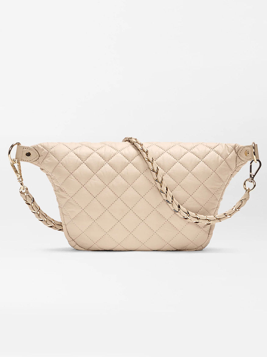 Beige quilted MZ Wallace Small Crosby Sling Bag in Buff Oxford with a diamond pattern and chain strap, displayed against a plain light background—an elegant and timeless accessory.