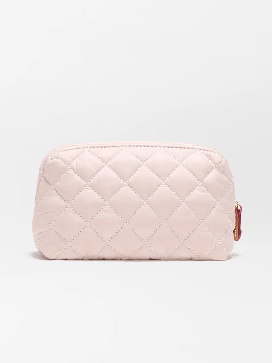 The MZ Wallace Small Double Zip Cosmetic in City Pink Oxford features a light pink quilted design with Italian leather trim and a zip top closure, shown against a plain white background.