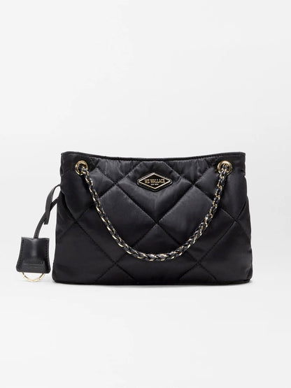 MZ Wallace Small Frankie Tote in Black Bedford, featuring quilted nylon, gold chain handles, a gold logo plate, and a small attached case on the left side, comes with an adjustable crossbody strap—displayed against a plain white background.