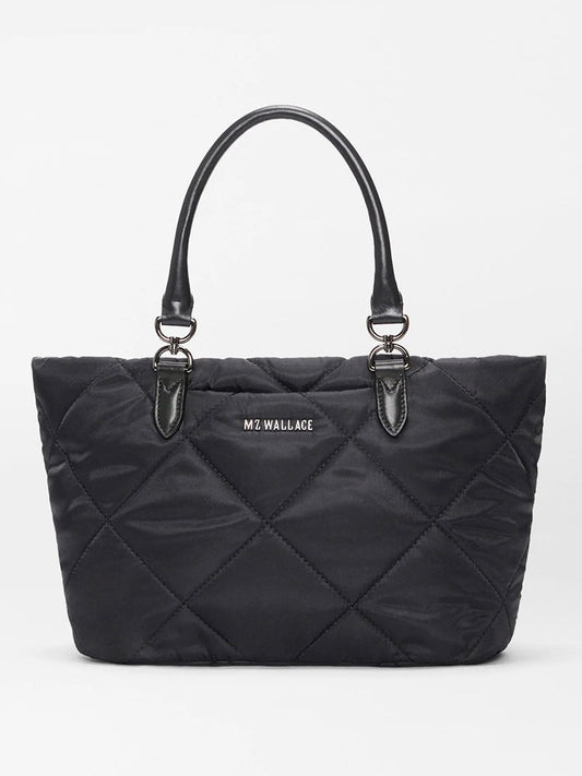 The MZ Wallace Small Madison E/W Tote in Black Bedford features two handles, silver hardware, Italian leather trim, and the brand name on the front.