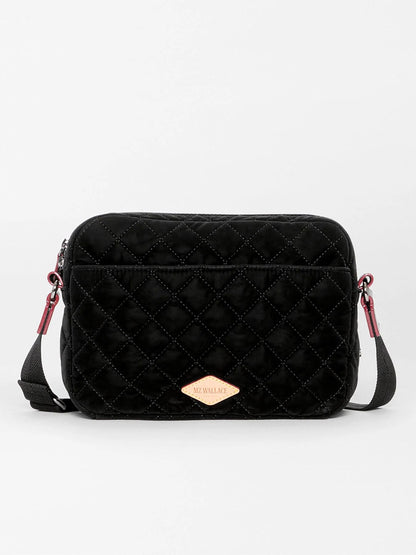 Black MZ Wallace Small Metro Camera Bag in Black Velvet Finish featuring a quilted texture, a crossbody strap, and a small logo patch on the front.