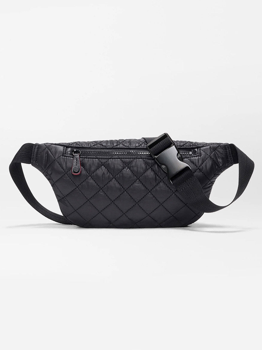 The MZ Wallace Small Metro Sling in Black Oxford features a quilted design, zippered main compartment, adjustable crossbody strap, and Italian leather trim, shown against a plain white background.