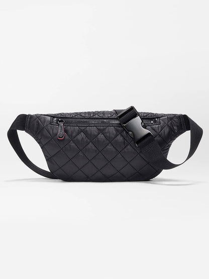 The MZ Wallace Small Metro Sling in Black Oxford features a quilted design, zippered main compartment, adjustable crossbody strap, and Italian leather trim, shown against a plain white background.
