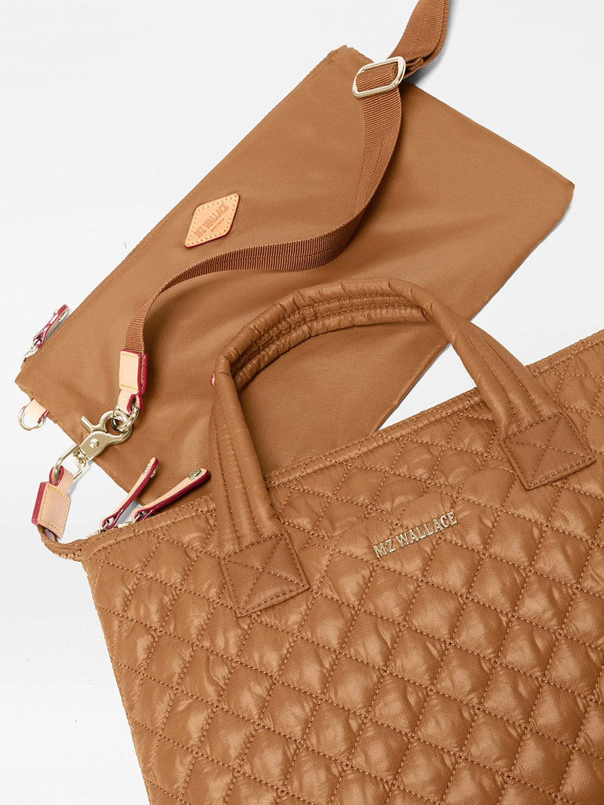 MZ Wallace Small Sutton Deluxe in Cognac Oxford quilted handbag, featuring double handles and a detachable matching pouch.
