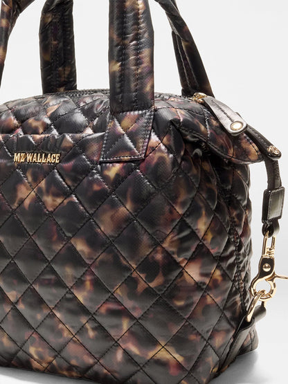 MZ Wallace Small Sutton Deluxe in Tortoise Shell Oxford, a small quilted handbag in dark brown and black with gold-toned hardware and a versatile crossbody tote design.